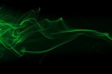 Movement Of Green Smoke On Black Background For Art Design