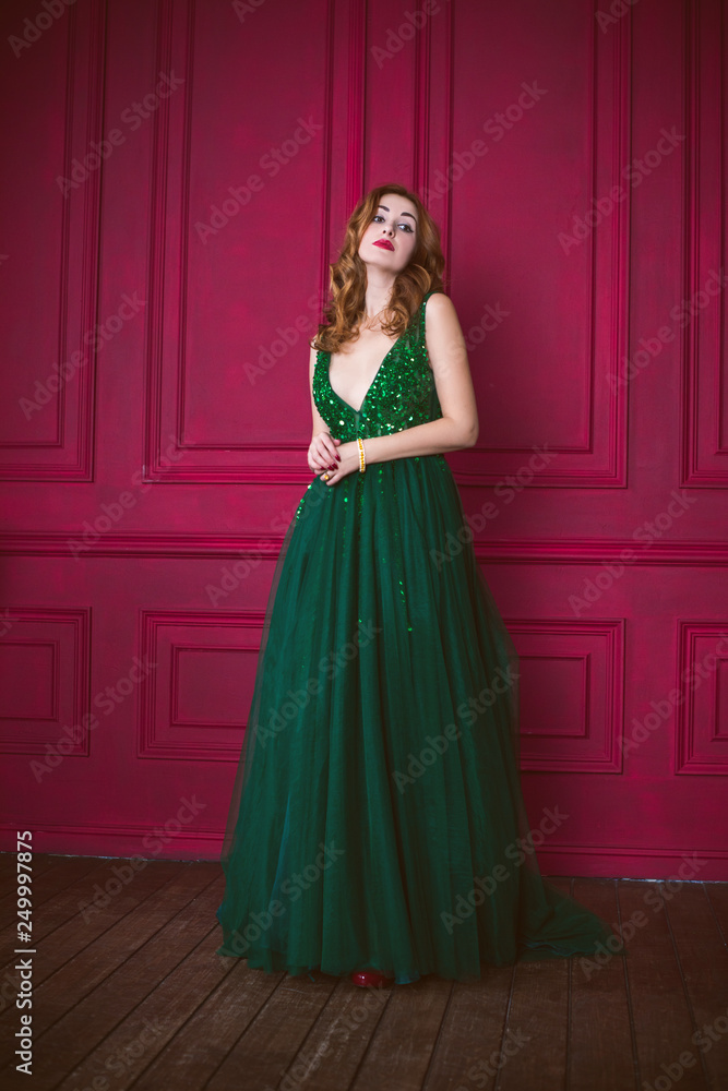 Gorgeous woman in green evening long dress, inspiration fashionable clothes for ladies. Vintage hairstyle and make up Stock Photo | Adobe Stock Gorgeous woman in green evening long dress, inspiration fashionable clothes for ladies. Vintage hairstyle and make up Stock Photo | Adobe Stock