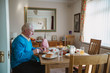 © dglimages - Senior Man Having Lunch