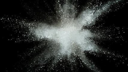 White powder exploding on black background in super slow motion, shot with Phantom Flex 4K