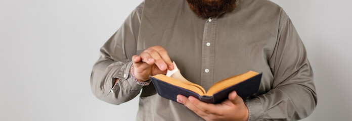 A man reading the Holy Bible.