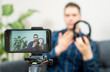 © M-Production - Man making video blog about music headphones.