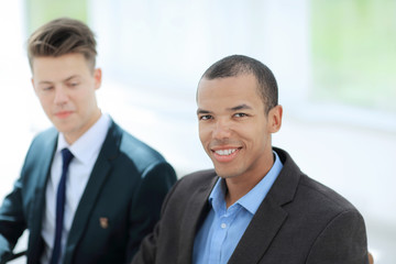 closeup.portrait of a young businessman in the office