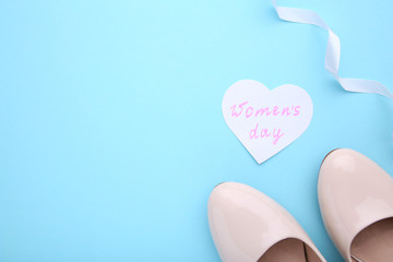 Wall Mural - Womens Day concept with accessories on blue background