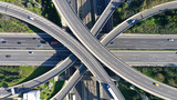 Aerial drone photo of highway multilevel junction interchange crossing road 