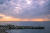 Fototapeta  - Beautiful sunset at the sea near Boccadasse  Genoa, Italy.