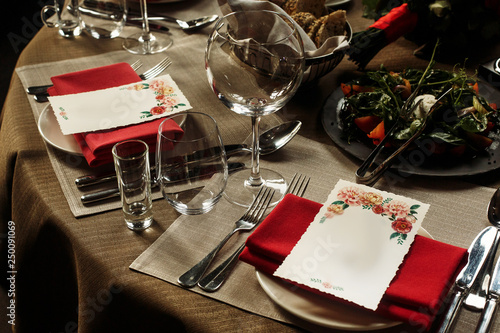 Luxury Wine Glasses And Silver Tableware Near Plates With Red