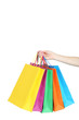 © 5second - Female hand holding colorful shopping bags on white background