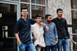 © AS Photo Family - Group of four indian mans, wear on casual clothes, posed outdoor at street of India.