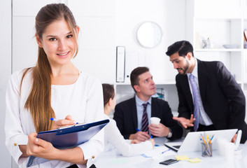 Wall Mural - Business woman writing down tasks