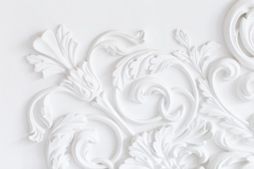 Wall Mural - Beautiful ornate white decorative plaster moldings in studio