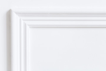 Beautiful ornate white decorative plaster moldings in studio