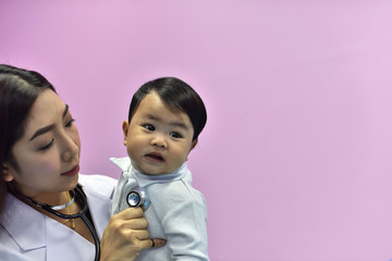 	 Doctors and children who are treated. Children get vaccinated at the hospital.The doctor is playing and getting acquainted with the little boy