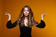 © burdun - Curly hair blonde girl posing and meditating in a studio