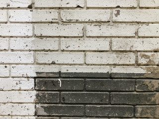 Brick wall. Architecture. Gray and white stone. Brick building