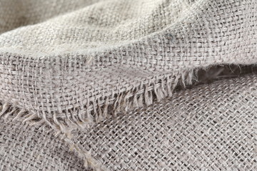 Closeup of burlap hessian sacking. Texture canvas fabric as background. Light natural linen texture for the background