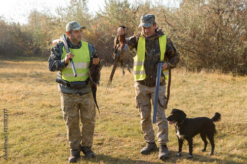 Hunter With A Gun And Dog Go On The First Snow In Hunter With A Gun And Dog Go On The First Snow In