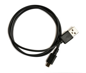 Black USB cable plug isolated on white background. USB - micro USB.