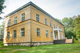 Fototapeta Storczyk - KOUVOLA, FINLAND - SEPTEMBER 20, 2018: Beautiful yellow old building of abandoned Anjala manor. The building was built at the turn of the 19th century and belonged to the Wrede family from 1837