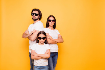 Wall Mural - Portrait of nice lovely content attractive charming serious people company team wearing dark glasses standing together isolated over shine vivid pastel yellow background