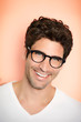© sanneberg - Portrait of glasses guy smiling to camera