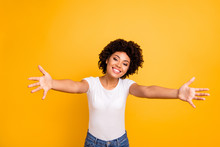 Close Up Photo Cheerful Beautiful Amazing She Her Dark Skin Lady Spread Hands Arms Come Here To Us Calling In Hugs Sweetheart Wear Casual White T-shirt Isolated Yellow Bright Vibrant Background