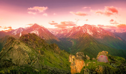 Poster - mountain peaks with remnants of snow in the early morning and a mountain gorge in summer in Dombay, Caucasus, Russia