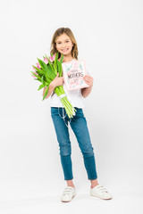 Wall Mural - adorable child holding bouquet of pink tulips and happy mothers day greeting card on white background