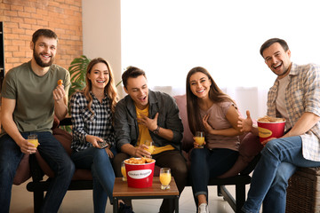 Poster - Group of friends eating nuggets while watching TV at home