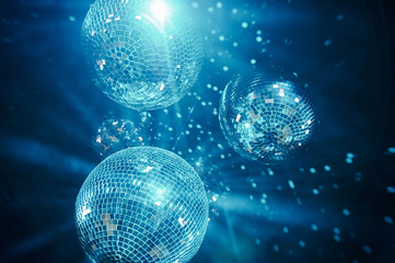 classic blue shining disco balls. disco atmosphere concept. color of the year 2020