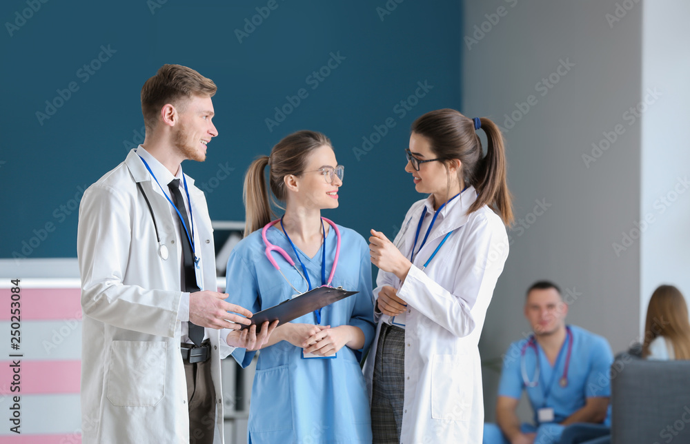 Doctors discussing results of analyses in clinic