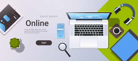 mobile computer app online top angle view workplace desktop with laptop tablet smartphone screen office stuff horizontal copy space