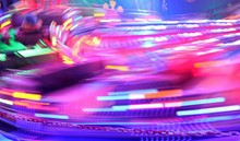 Disco Lights Synthwave Neon Fairground Ride Night Lights Funfair Light Trails, Slow Shutter-speed Long Exposure Illuminations Futuristic Sci Fi Stock, Photo, Photograph, Picture, Image