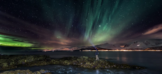 Wall Mural - Amazing aurora borealis - northern lights - view from coast in Oldervik, near Tromso city -  north Norway - banner