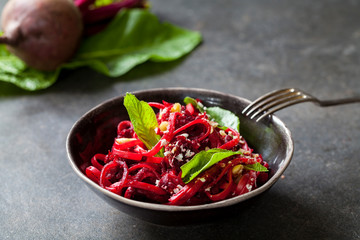 Wall Mural - Beetroot spaghetti with hazelnuts and horseradish