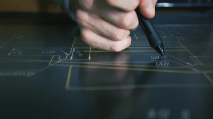 Wall Mural - designer architect using creative pen display tablet working with drawings in night office. drawings