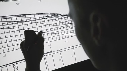 Wall Mural - young designer architect using creative pen display tablet working at night office. using interactiv