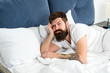 © be free - Man bearded hipster woke up too early and feels sleepy and tired. Early to get up. Keep you wide awake in the early morning hours. Insomnia and sleep problems. Reasons you are waking up too early