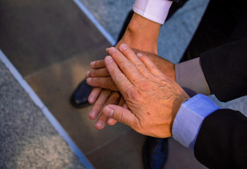 Business teamwork.They are join hands  mean teamwork  and spirit.together, develop,connection.Photo concept My partner Business and Success.