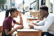 © Rawpixel.com - Couple reading the menu at a cafe