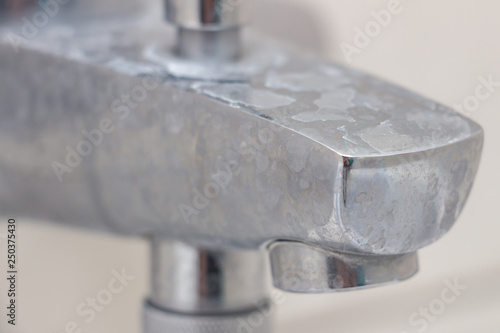 Close Up Of Shower Mixer Faucet With Limescale White Chalky