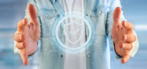 Wall Mural - Man holding a Shield web security concept 3d rendering