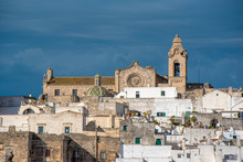 Panorama Of The Picturesque Old Town And Roman Catholic Cathedral  - Assumption Of The Virgin Mary (Concattedrale Di Santa Maria Assunta). The White City In Apulia On The Hill - Ostuni , Puglia, Italy