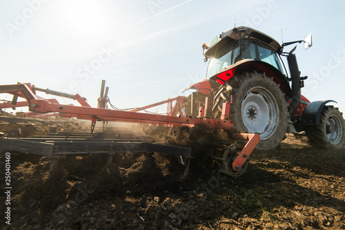 Fotografía Plowing of stubble field