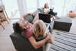 © Yakobchuk Olena - Loving parents with laptop and their daughter spending time together at home