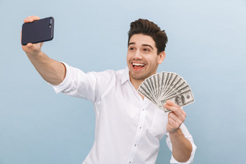 Wall Mural - Portrait of a cheerful handsome young man