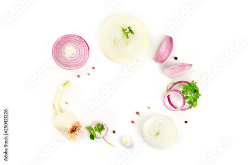 Cuadros en Lienzo Red and white onions, shallots, parsley leaves and peppercorns, shot from above