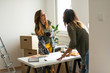 © Stock Rocket - Lesbian couple renovating the apartment