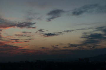 Wall Mural - twilight sunset sky above the city