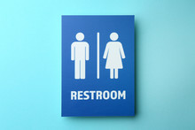 Unisex Restroom Sign Board On Color Background. Concept Of Transgender